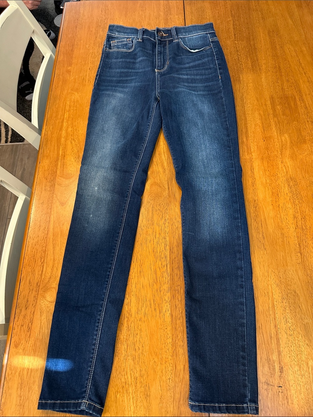 H & M high rise skinny jeans size 24. Med blue denim slightly distressed. EUC